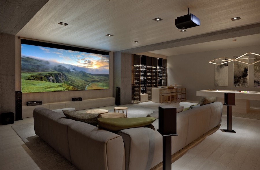 A home theater with modern amenities like surround sound and projector.