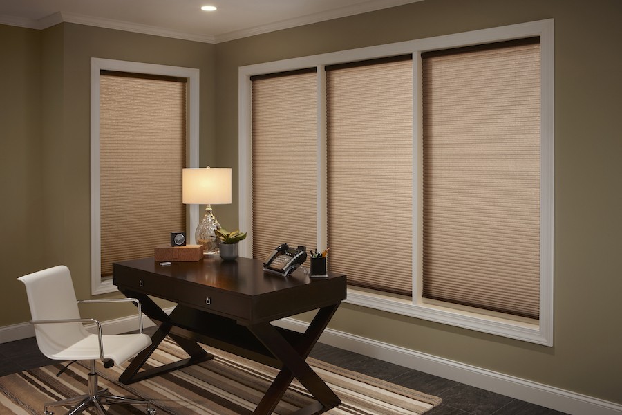 An elegant office space equipped with Lutron motorized shades.